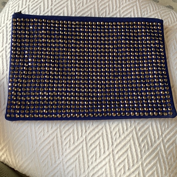 Neiman Marcus Handbags - Oversized studded clutch